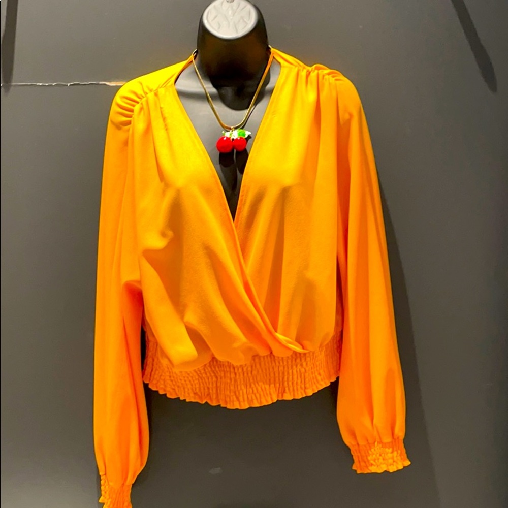 Bright tangerine blouse